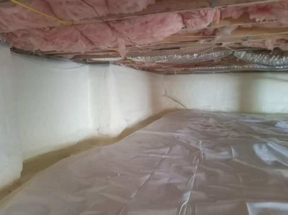 Crawl space encapsulation with closed-cell spray foam for Commercial Roof Restoration in Woodward